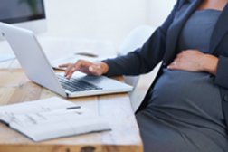 Pregnant business woman article